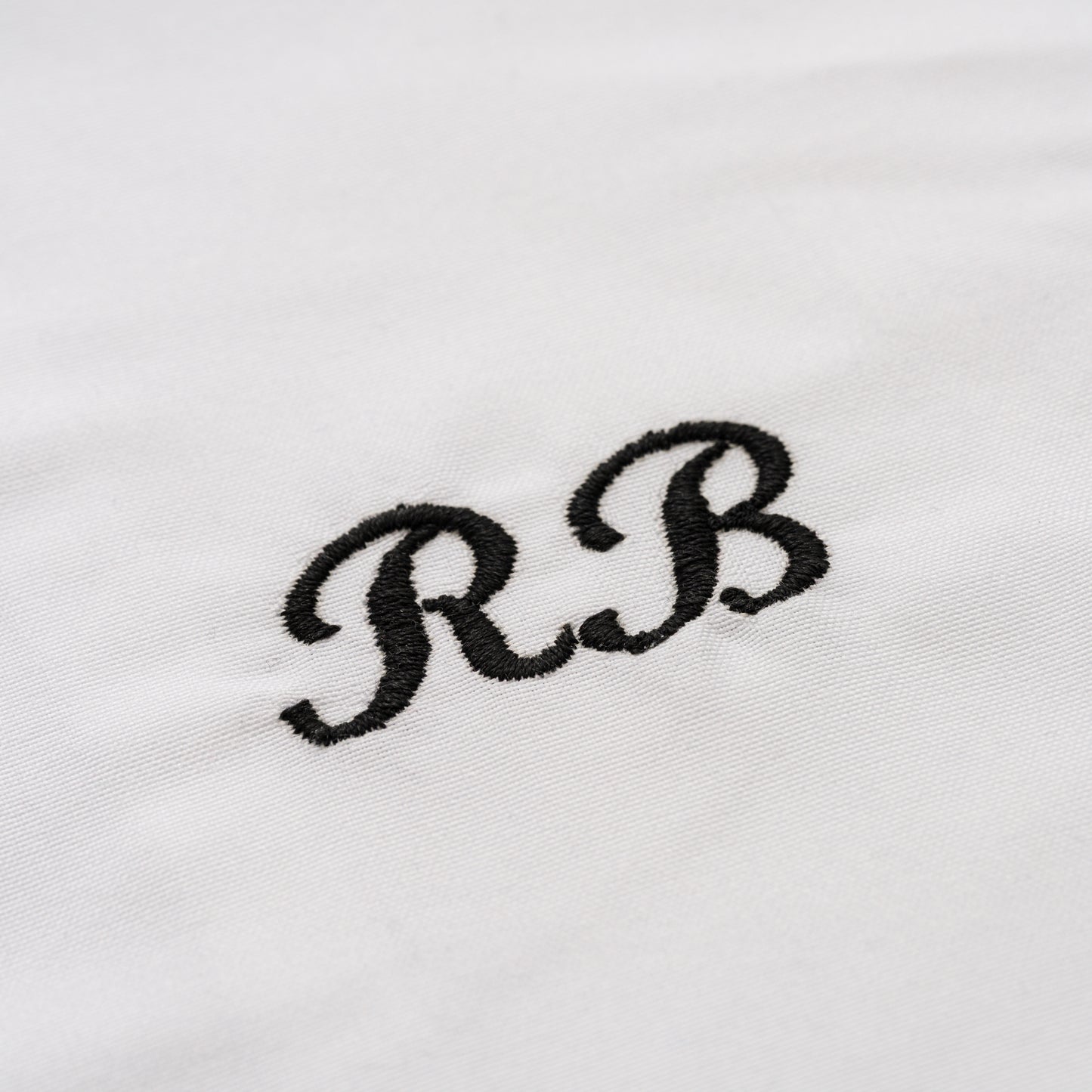 EMBROIDERED INITIALS RUFFLE PILLOWCASE