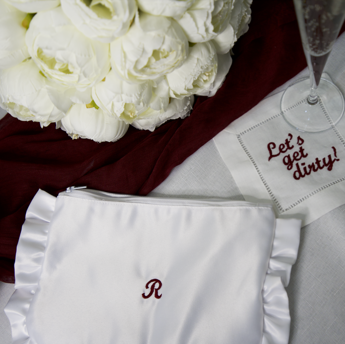 EMBROIDERED INITIAL WHITE SATIN RUFFLE MINI CLUTCH BAG
